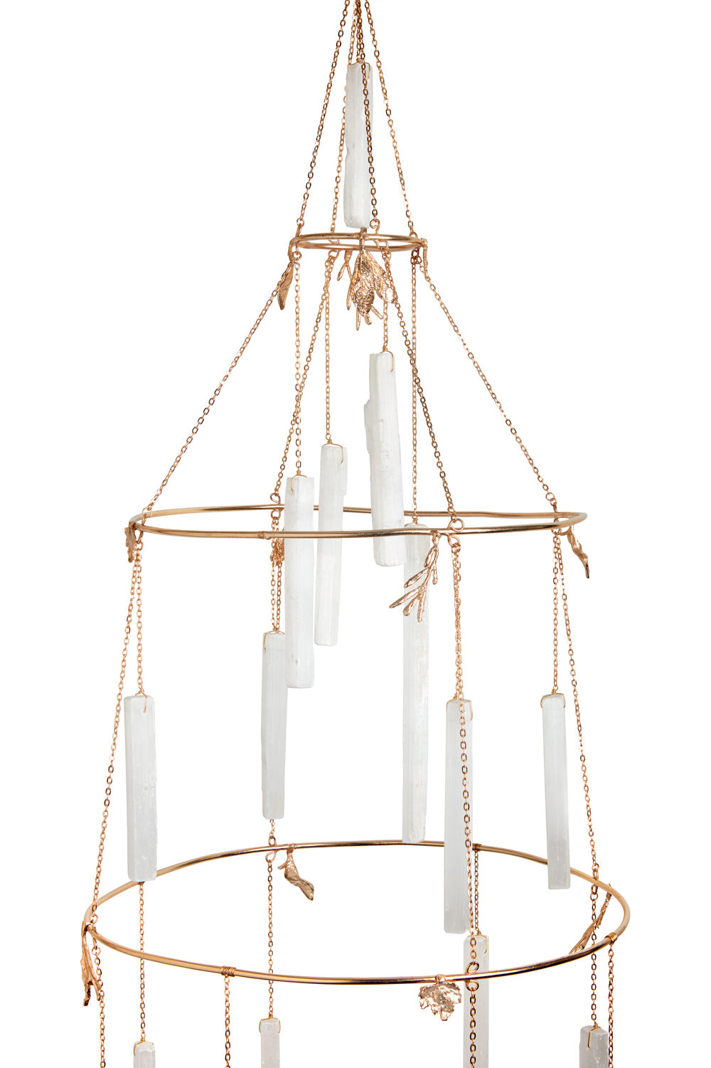 Close-up of raw selenite logs hanging from the gold rings of the Selenite Crystal Chandelier - Ariana Ost