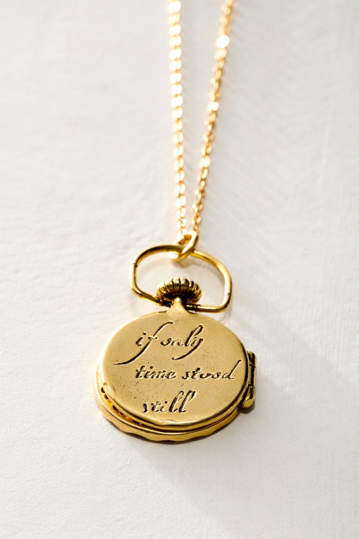 Back of the Clock Locket, engraved If only time stood still - Ariana Ost