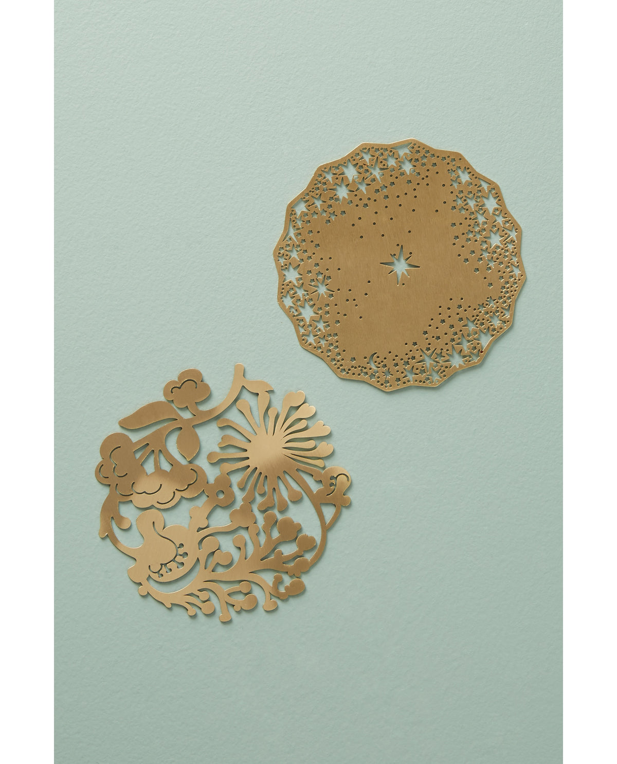 Gold Floral Wreath and Celestial Coasters on a sage table - Ariana Ost